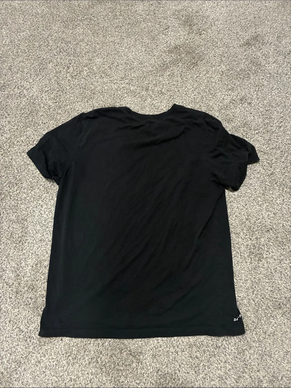 Nike Black Short-Sleeve Basketball Graphic Tee with Blue Swoosh and Red Accents